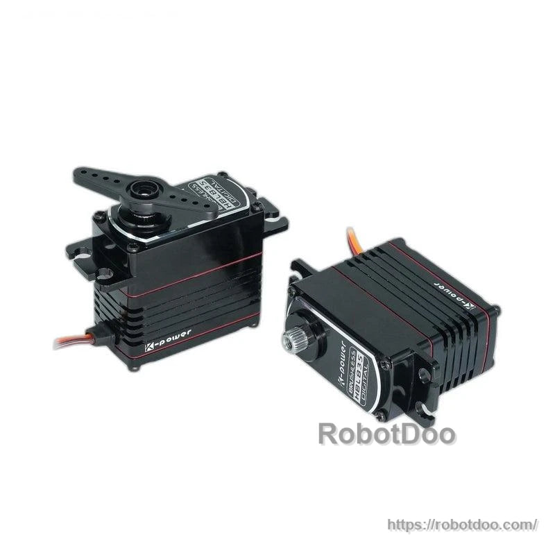 Two-angle view of Kpower servo motors showing side housing fins, horn installed, and cable exit