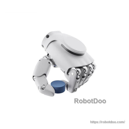 Robotic hand gripping a small blue cylinder, rear underside view showing finger mechanisms