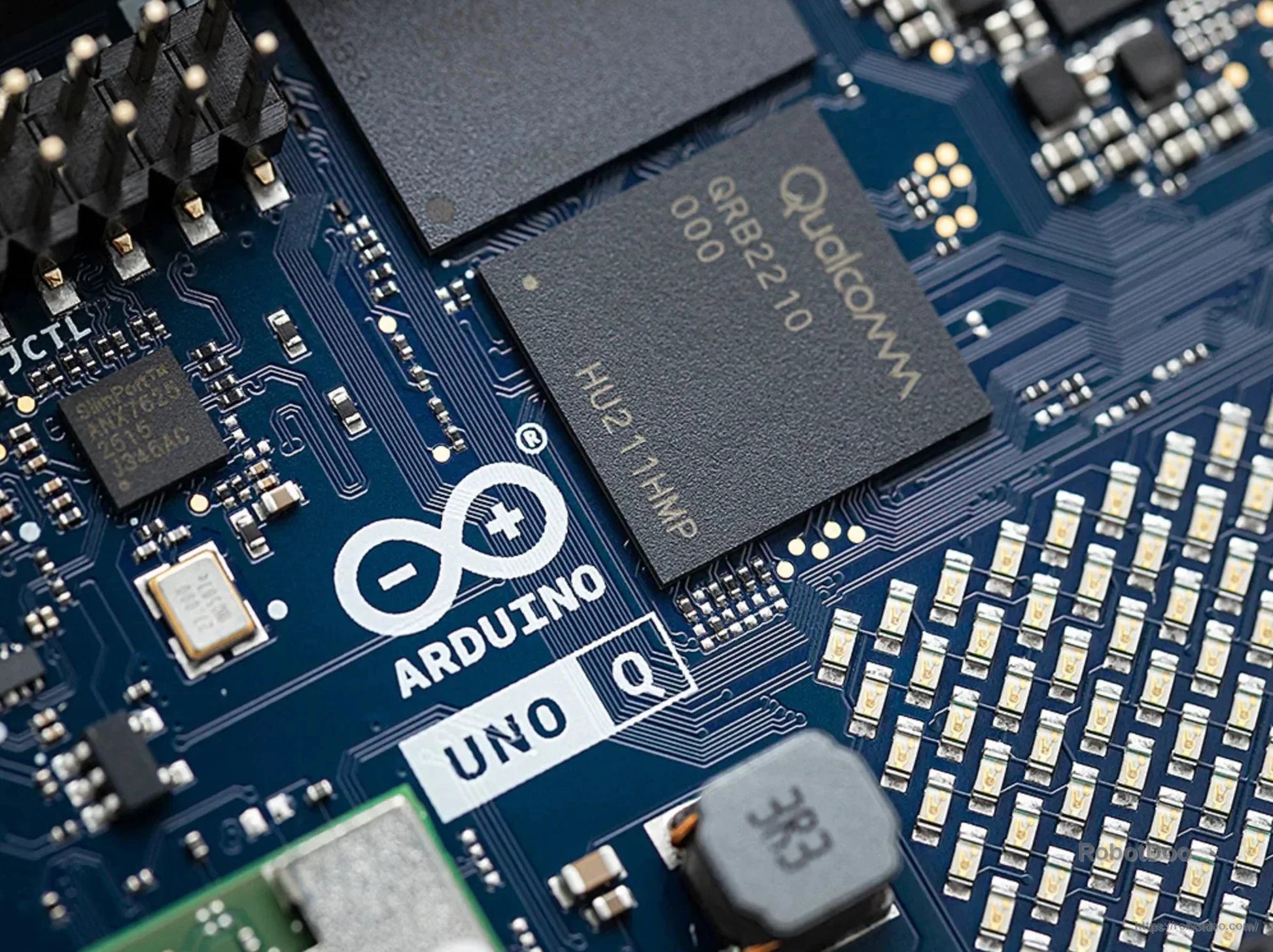 Close-up of Qualcomm Dragonwing QRB2210 chip on the Arduino UNO Q development board