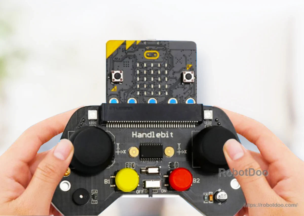 DaDa:bit micro:bit STEM robotics controller with dual joysticks, colored buttons, micro:bit board, and switches
