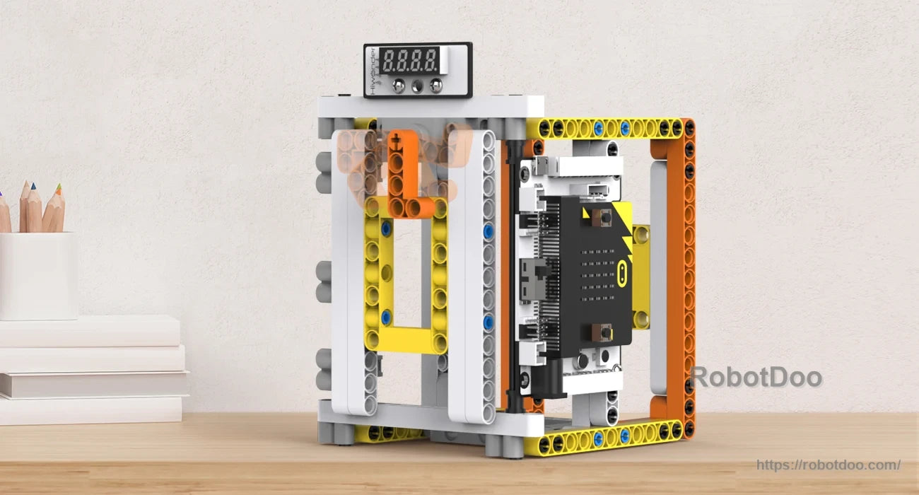 Micro:bit controller and multifunction expansion board integrated into a block-built model