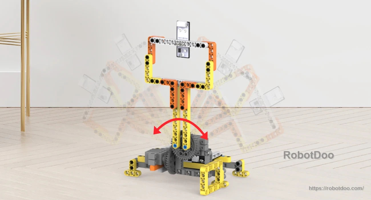 DaDa:bit micro:bit DIY building blocks robot with a screen head, wheeled base, and yellow-orange frame