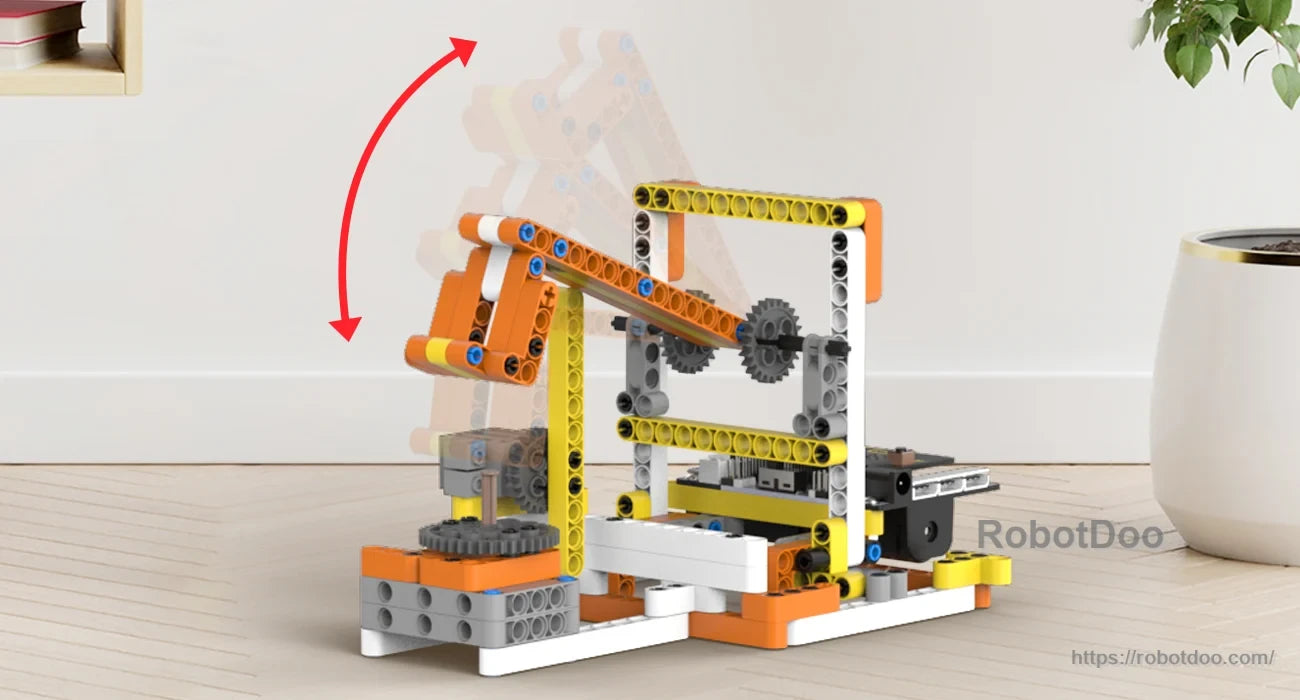 Gear-driven robotic arm lifting a block on a compact building-block base