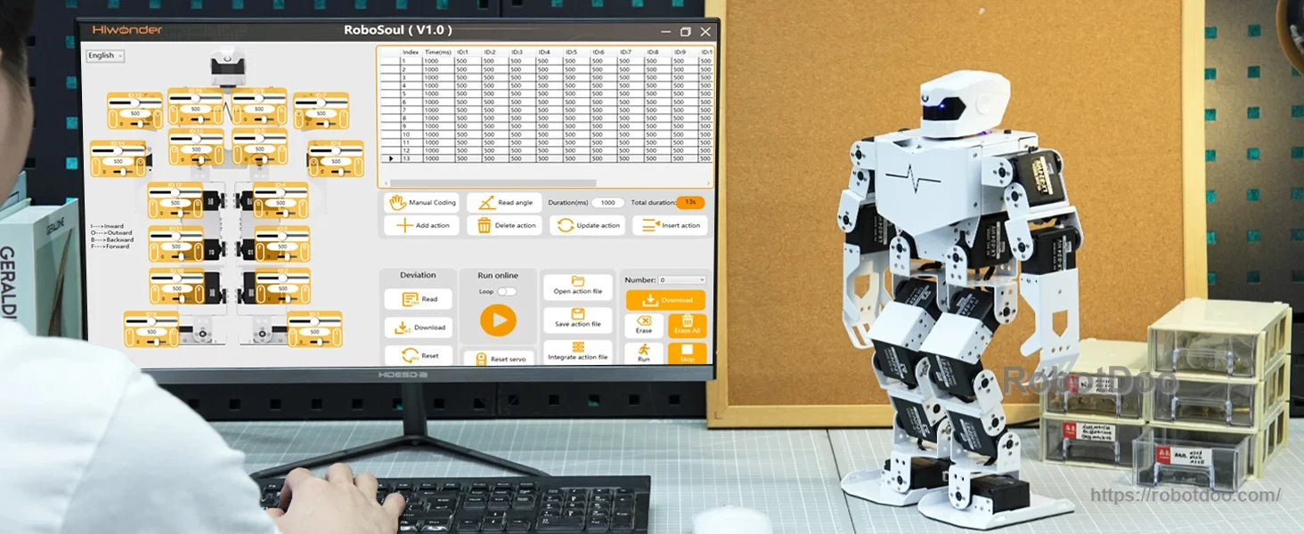 H5S humanoid robot beside a computer running graphical action-editing software