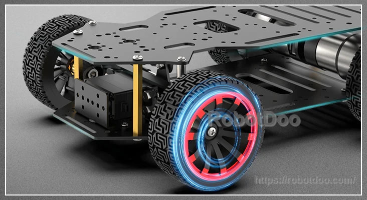 Low-angle view of black anodized aluminum chassis, layered plates, and solid rubber tire detail