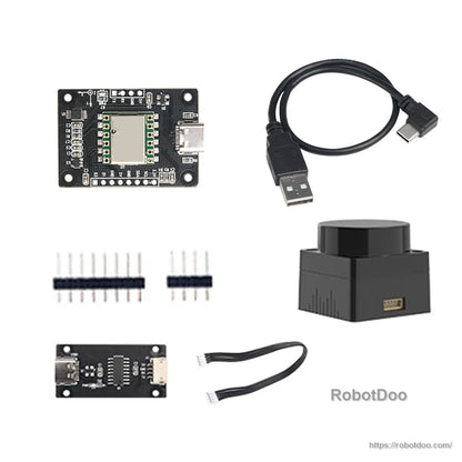 Kit contents with IMU board, USB-C cable, pin headers, small interface board with two cables, and a black sensor unit