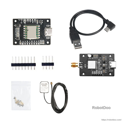 Expanded kit contents showing IMU board, USB-C cable, SMA-connector board, GPS antenna, screws and pin headers