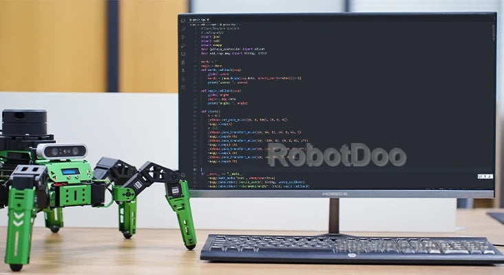 Hiwonder JetHexa ROS hexapod robot with green articulated legs beside a monitor displaying code