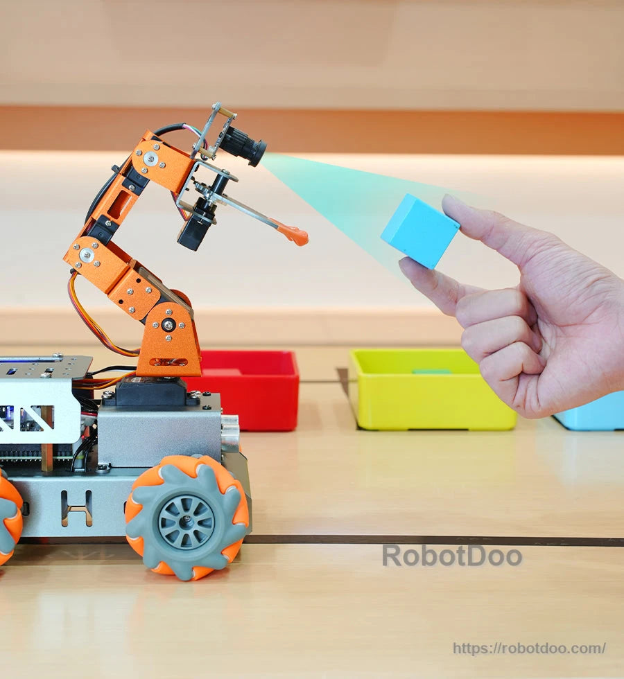 Side view of MasterPi robotic arm camera tracking a blue cube held by a user