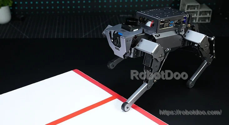 ROSPug robot approaching a red-bordered path for camera-based line following