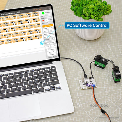 Hiwonder serial bus servo controller tester connected to laptop running PC software control interface