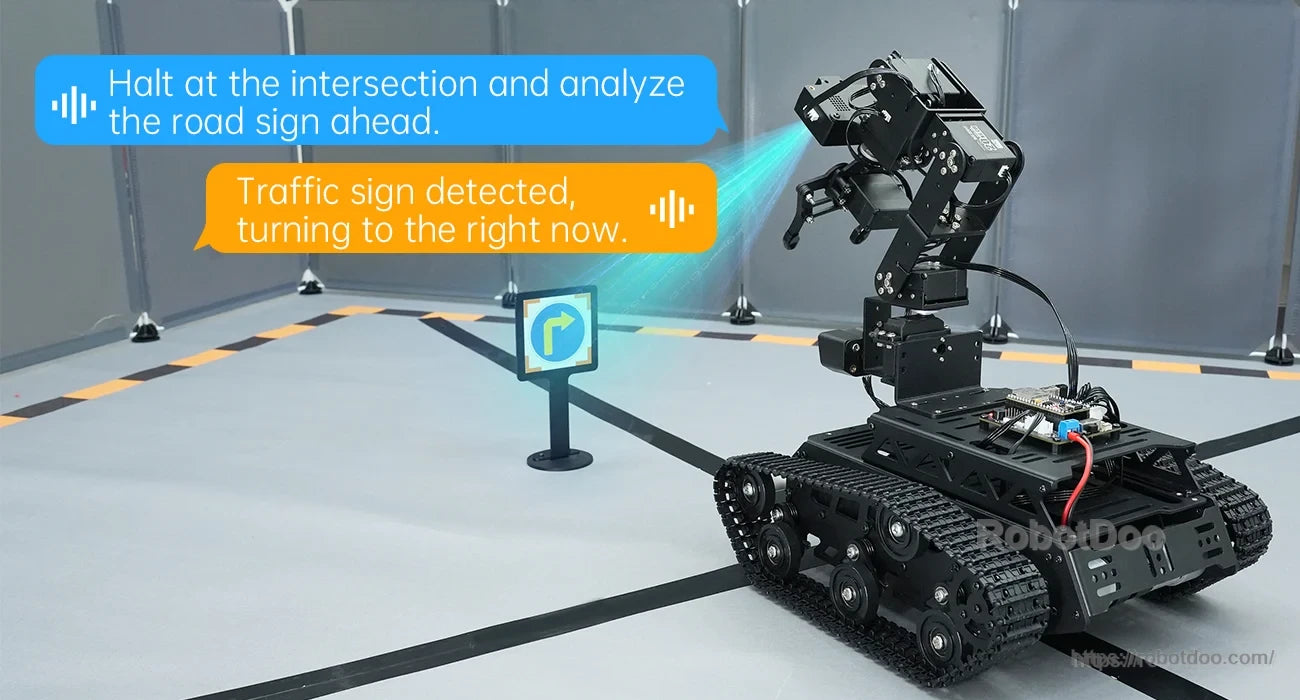 Hiwonder Tankbot ESP32-S3 AI tracked robot with robotic arm navigating a mock road intersection