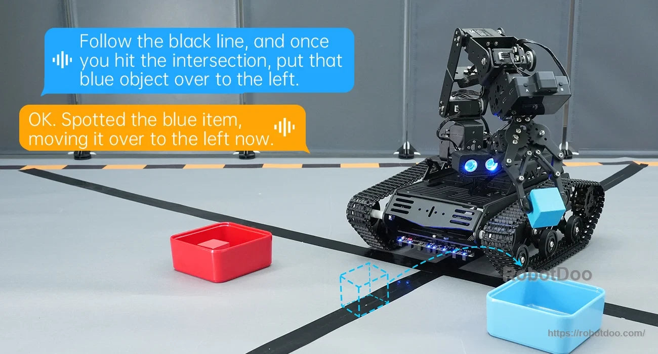 Hiwonder Tankbot ESP32-S3 tracked AI robot with articulated arm following a black line and moving a blue block