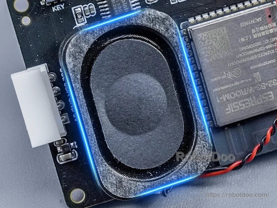Close-up of Tankbot onboard speaker beside the ESP32-S3 electronics