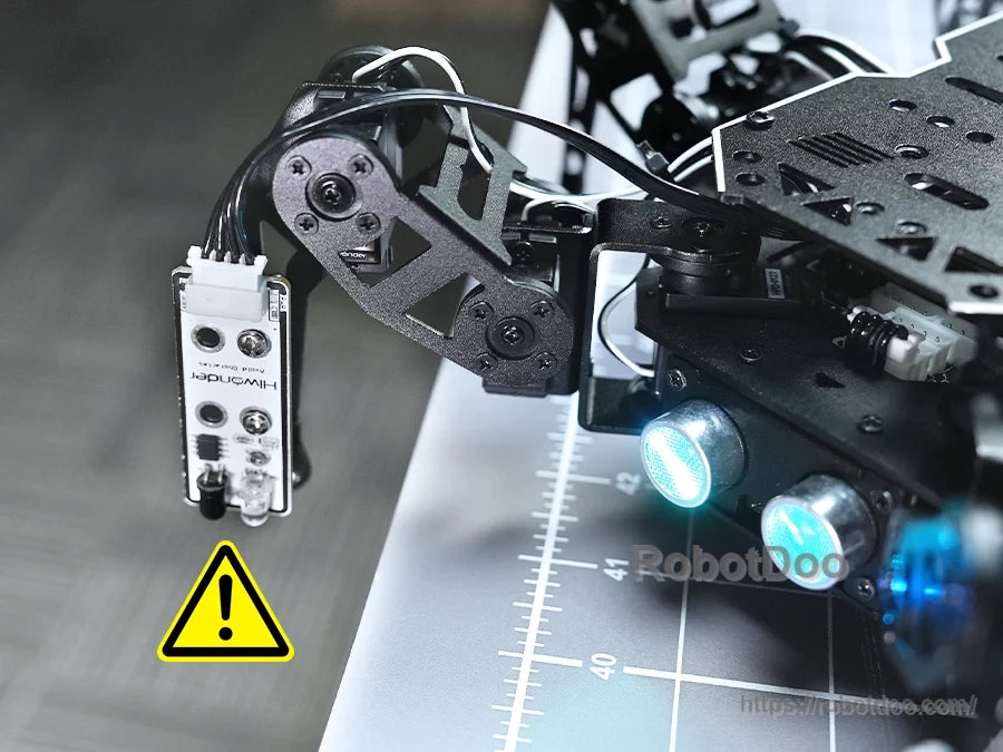 Hiwonder miniHexa 18DOF hexapod robot with black articulated legs, servo joints, and blue LED lights