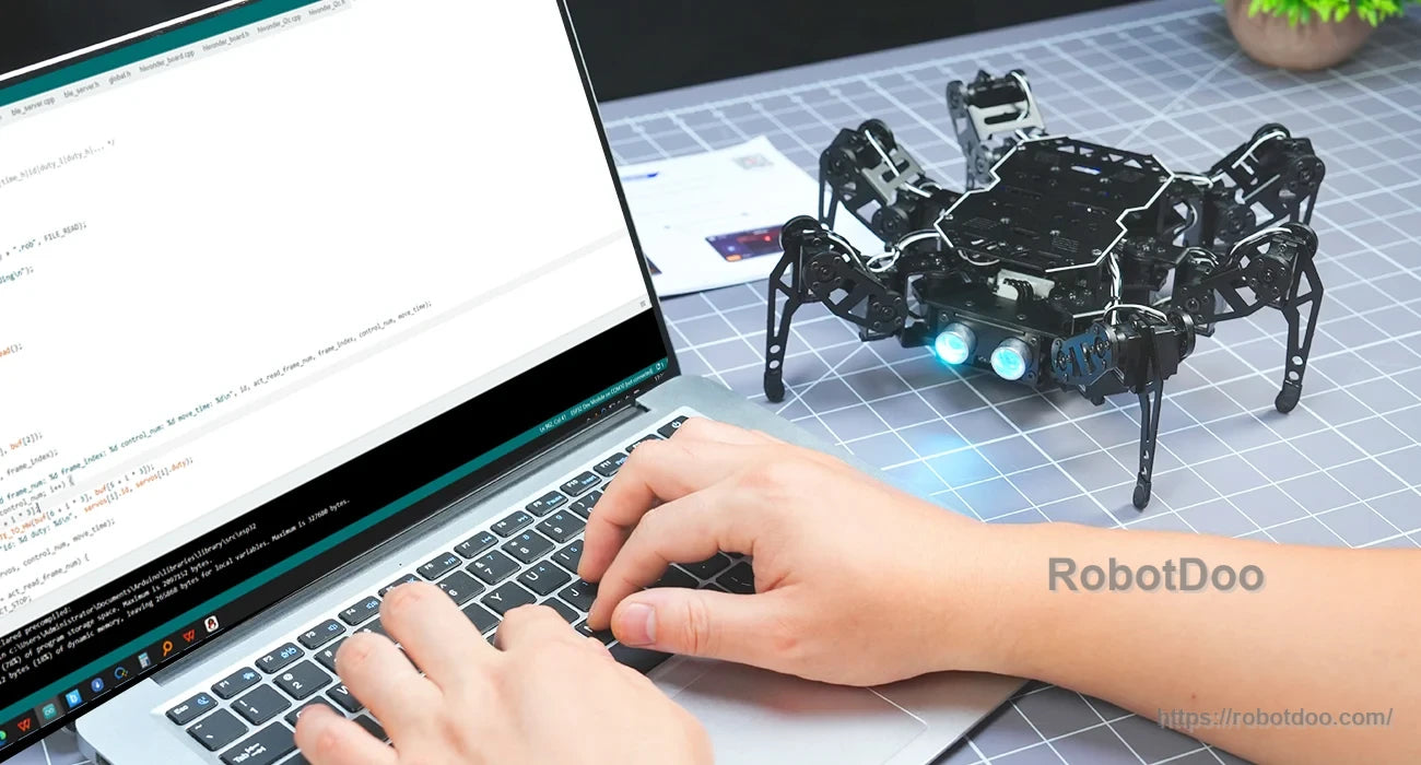 Hiwonder miniHexa 18DOF AI Hexapod Robot connected to a laptop for Arduino programming