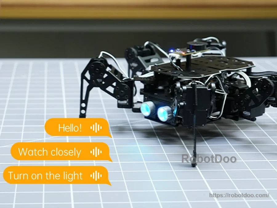 Hexapod robot demonstrating voice commands for greeting, attention, and light control
