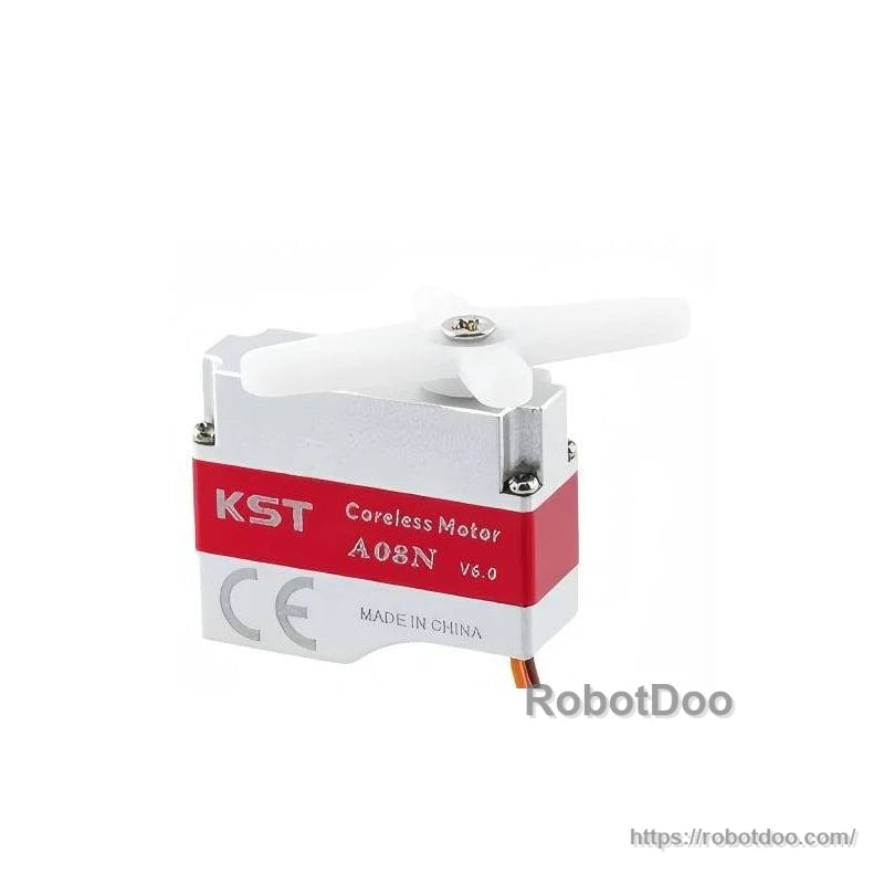 KST A08N coreless micro servo with cross servo horn fitted, showing horn screw and metal case