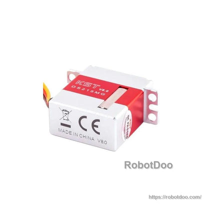 Underside view of KST DS215MG V8.0 servo showing CE mark, crossed-bin symbol, and Made in China
