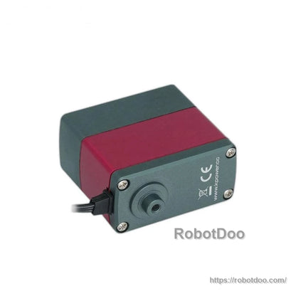 End view of servo motor showing mounting face, cable entry, and CE marking on the end plate