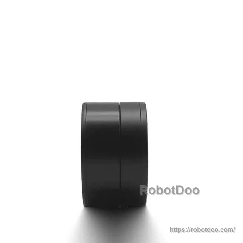 Side profile of the black cylindrical motor housing, showing thickness and seam line