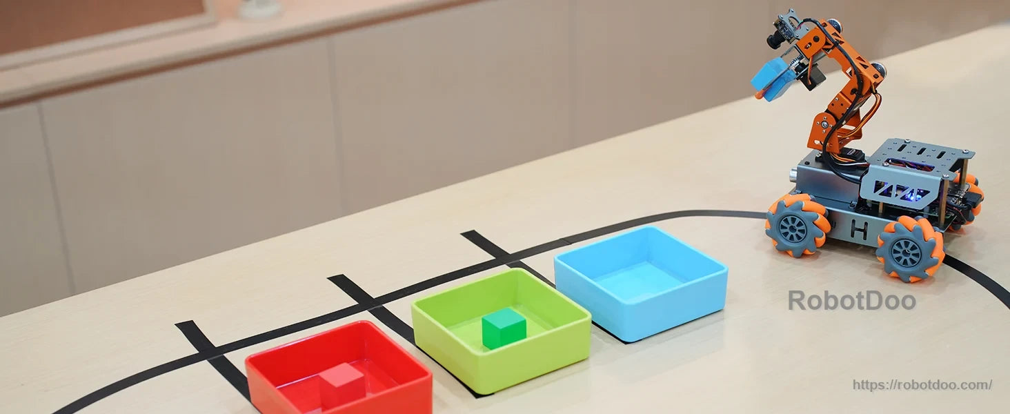 MasterPi robot arm car navigating a taped course toward colored sorting bins
