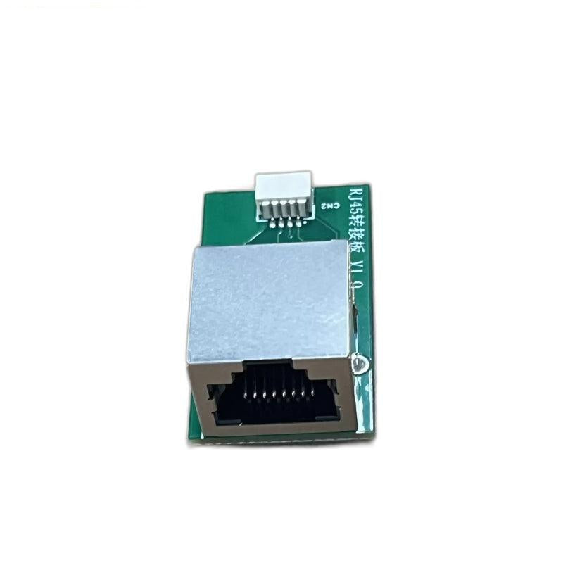 Front view of RJ45 Ethernet port on the module, showing jack opening and pins on green circuit board