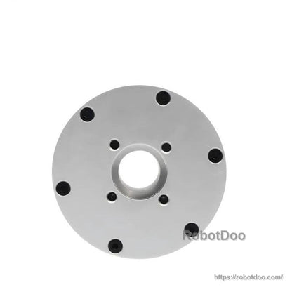 Rear mounting face of motor with bolt pattern and central bore, top-down view