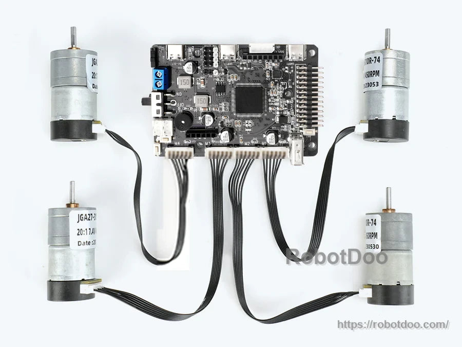 Four DC encoder motors connected to the board to demonstrate 4‑channel encoder motor drive wiring