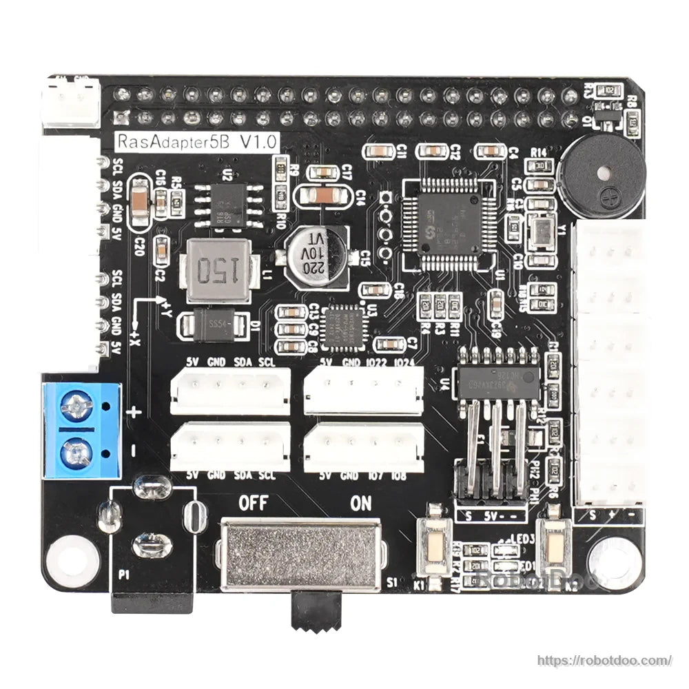 Close-up of RasAdapter5B V1.0 expansion board with screw terminal power input, I2C headers, and buzzer