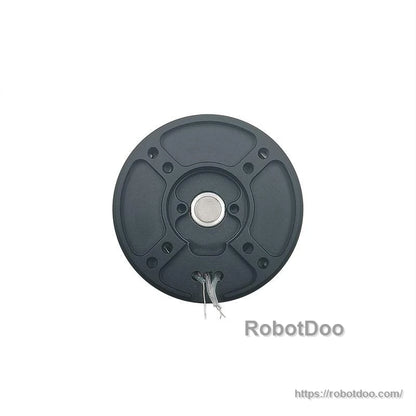 Rear view of reducer motor showing back cover, center hub, and wire leads exiting the housing