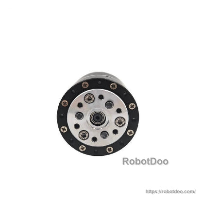 Close-up of metal output flange with center shaft opening and bolt pattern on planetary reducer motor