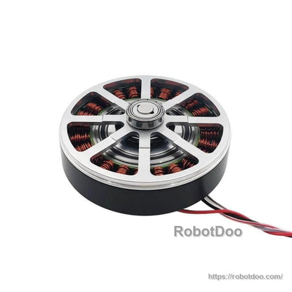 Open motor view showing rotor/stator layout and copper windings under the top plate