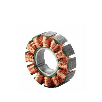 Angled view of motor stator ring core showing copper coil windings and laminated segments