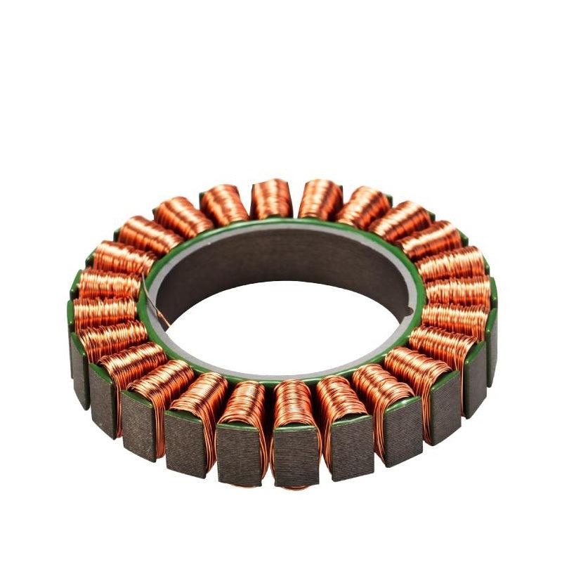 Motor stator ring close-up showing copper coil windings and laminated core segments