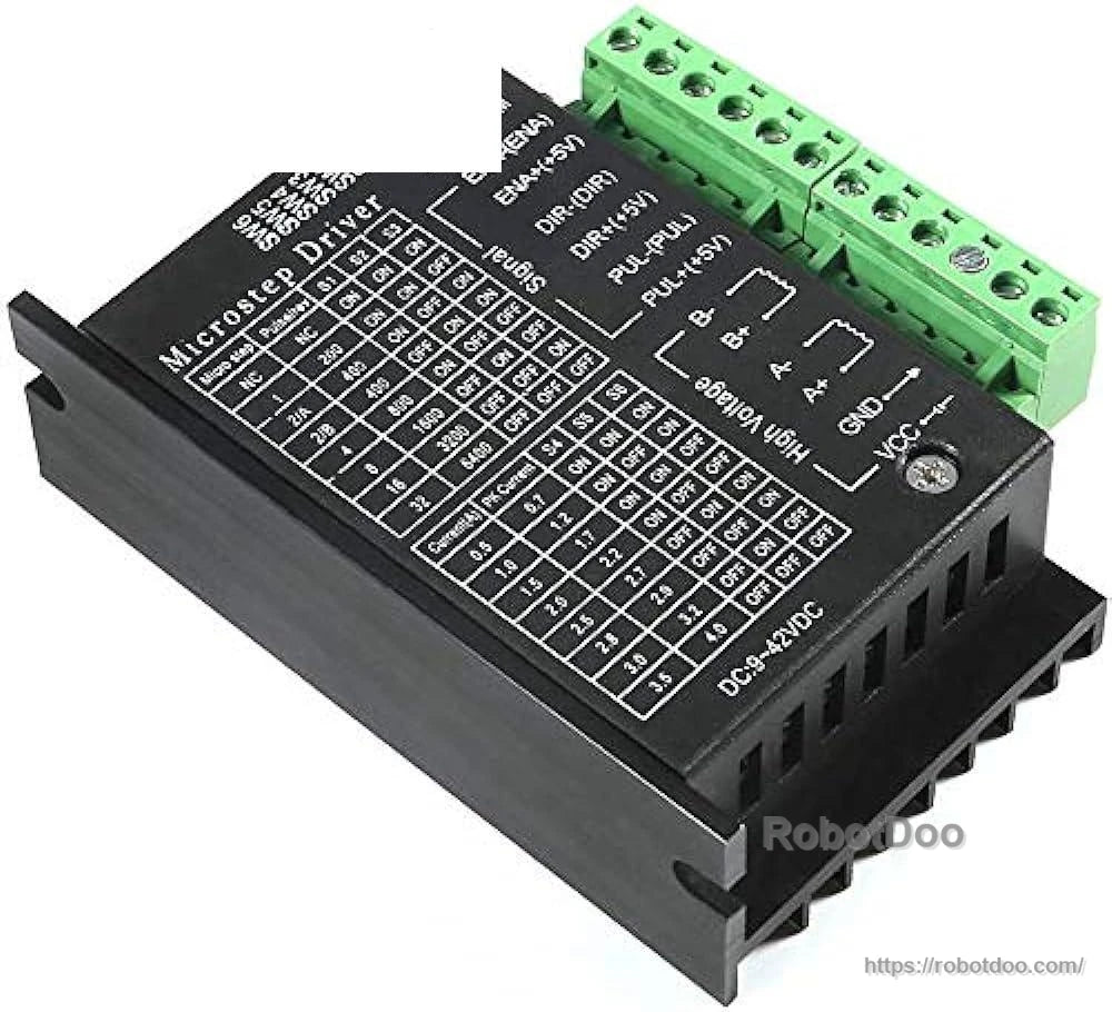 TB6600 controller top panel showing input wiring labels, DIP switches, and heat-sink housing