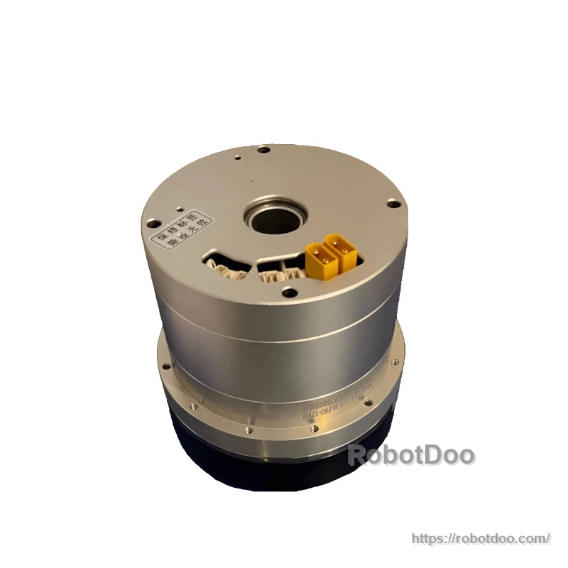 Three-quarter view highlighting top connector ports, center bore, and stepped cylindrical body
