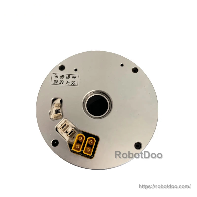 Bottom face view showing connector ports and inspection label near the center opening