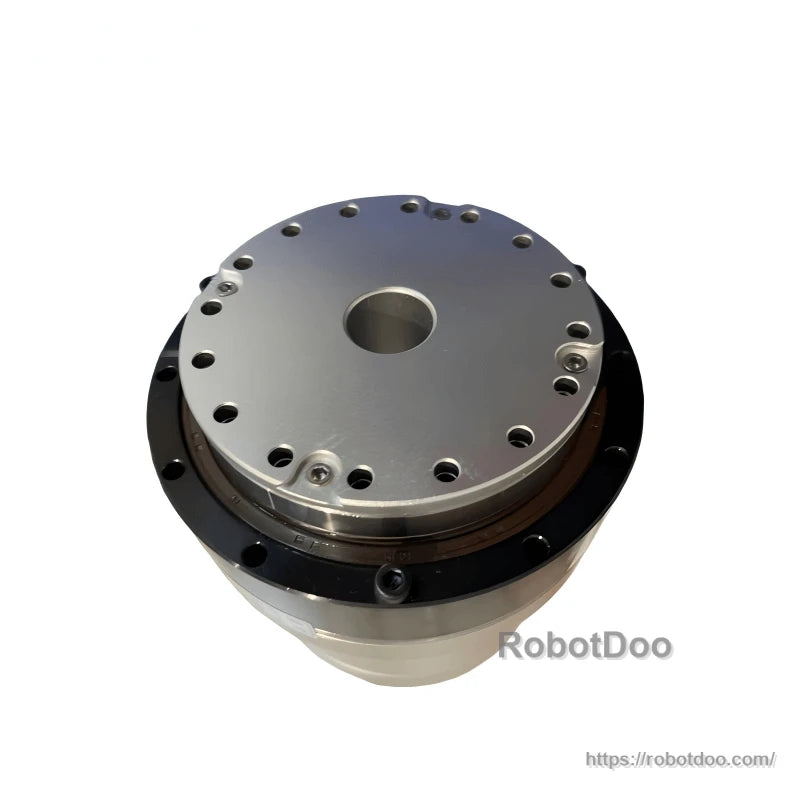 Top plate close-up showing circular bolt pattern, center hole, and black outer ring