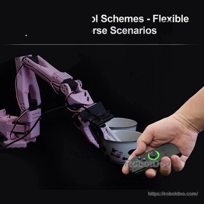 Controller in hand controlling a pink robotic arm over bowls, illustrating flexible use scenarios